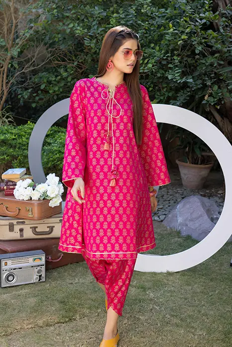 Standing pose in garden with PInk Pakistani Gul Ahmed Lawn Suits