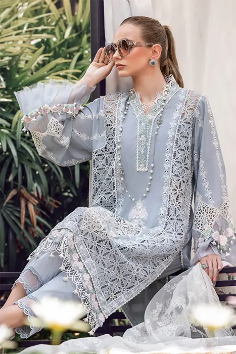 A Women Sitting in Pakistani Lawn Suit by Maira.B