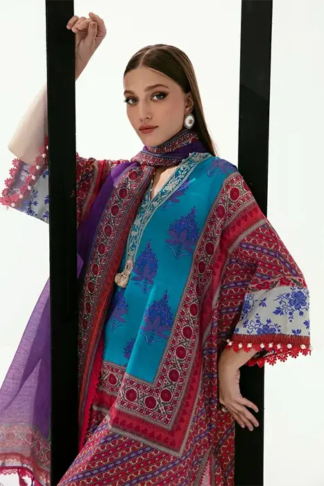 A beautiful turquoise colour pakistani suit by sana safinaz