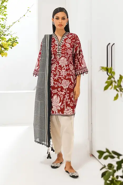 A red printed pakistani suit by sana safinaz
