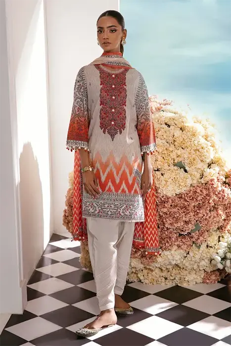 A beautiful peach colour pakistani suit by sana safinaz
