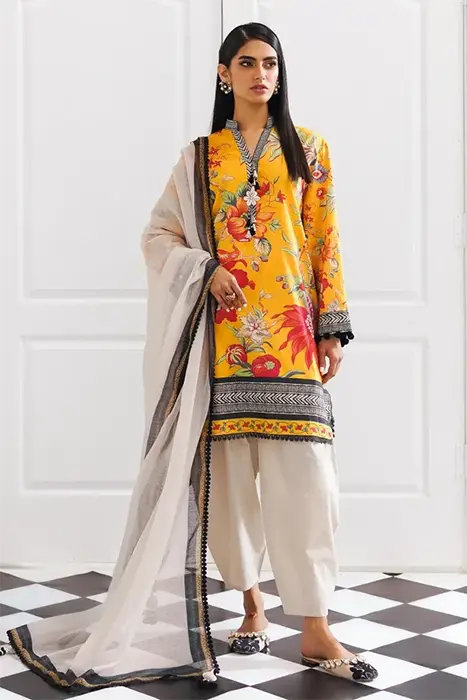 a yellow beautiful pakistani suit