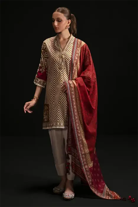 A brown beautiful prin pakistani suit