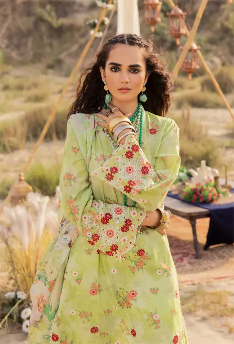 A women in Pista Colour Suit By Adan's Libas