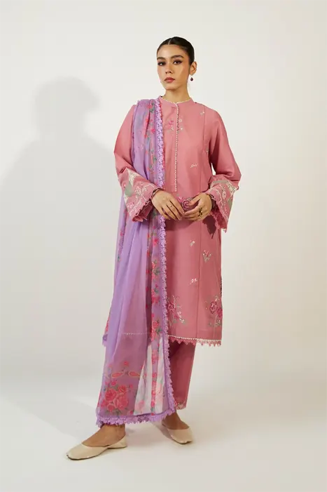 woman in pink suit by Zara Shahjahan