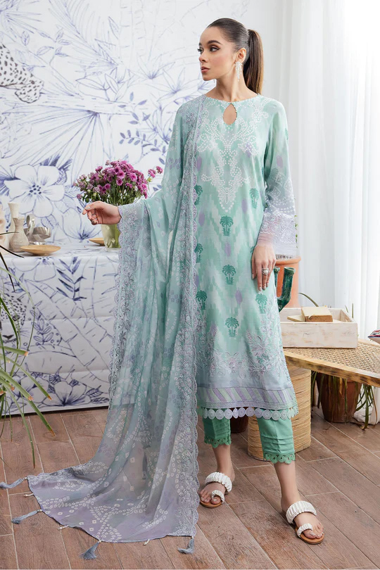 A Beautiful Woman in Green Floral Suit by Nureh Gardenia Collection