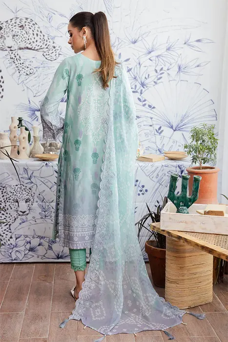 A Beautiful Woman in Green Floral Suit by Nureh Gardenia Collection